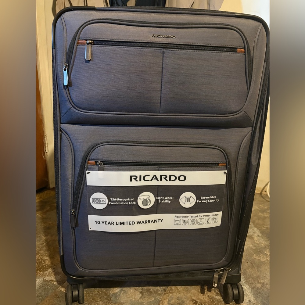 Ricardo and inusa luggage brand new with tags never used